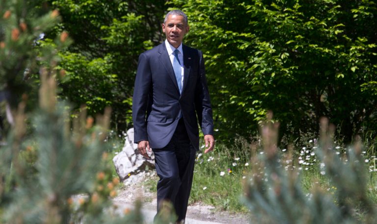 U.S. President Barack Obama walks to the arrivals area during the G-7 summit at Schloss Elmau hotel near Garmisch-Partenkirchen, southern Germany, Sunday, June 7, 2015. (AP Photo/Virginia Mayo)