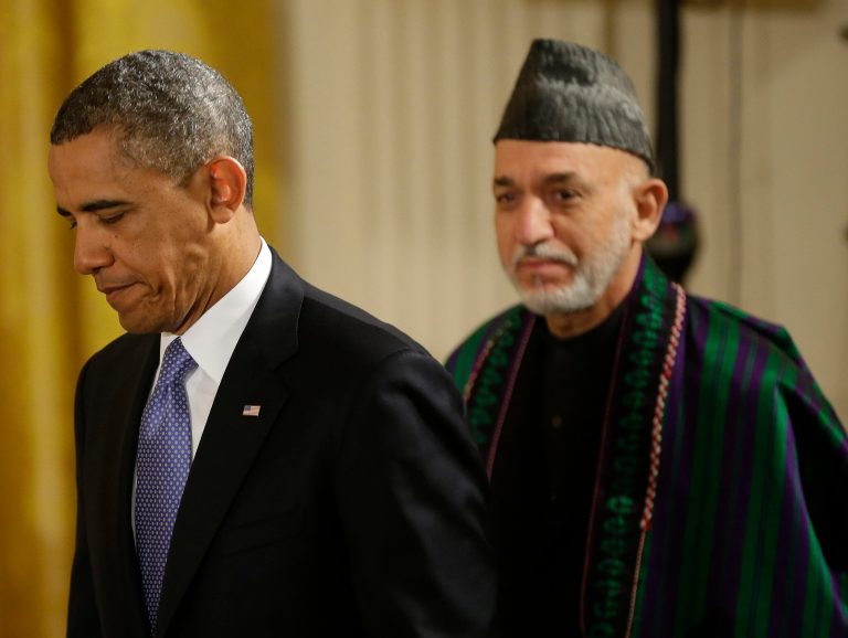 In this Jan. 11 file photo, President Obama and Afghan President Hamid Karzai arrive for their joint news conference in the East Room of the White House in Washington. Obama has ordered the Pentagon to begin drafting plans for a complete withdrawal of American troops from Afghanistan by the year's end in case the Bilateral Security Agreement is not signed, the White House announced Tuesday. (AP Photo/Pablo Martinez Monsivais)