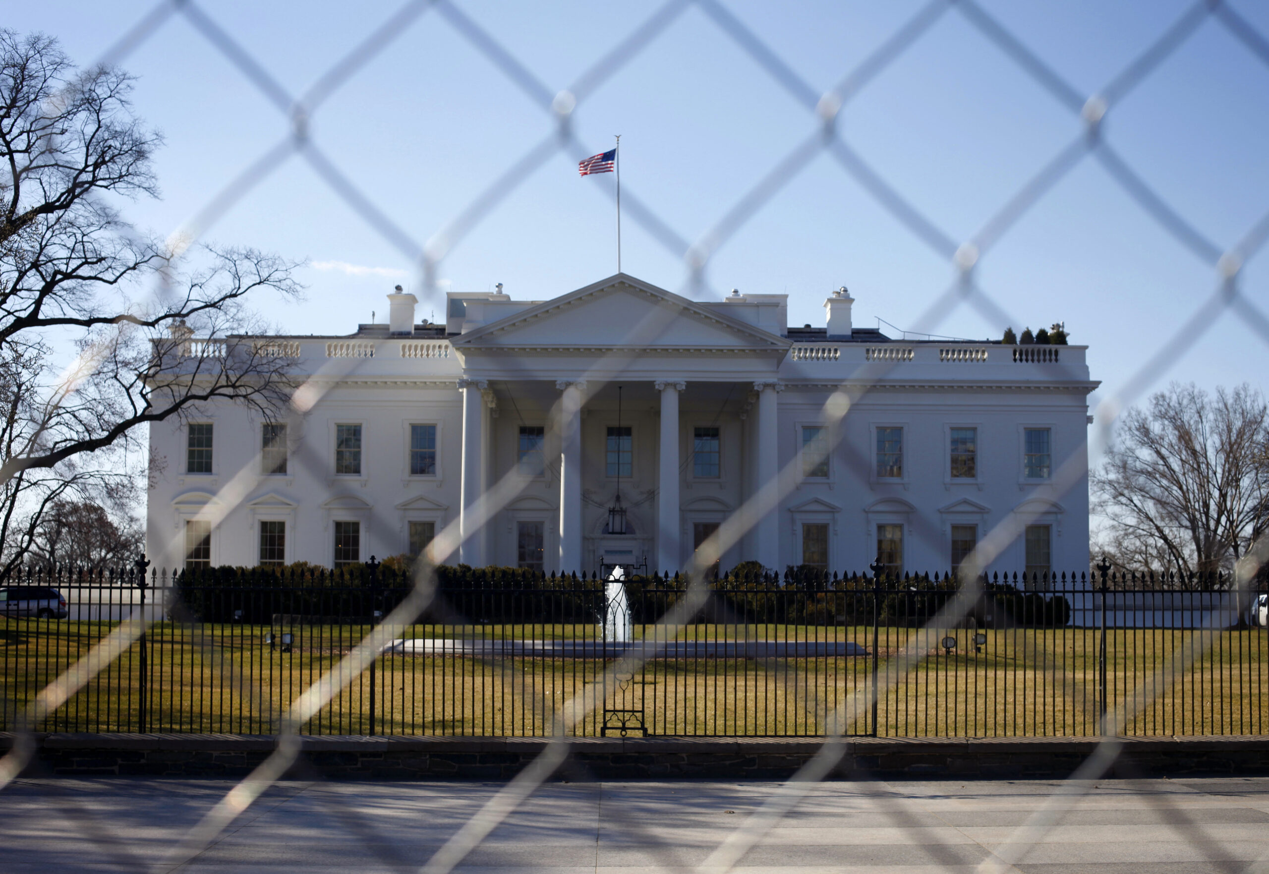 Man apprehended trying to jump White House fence