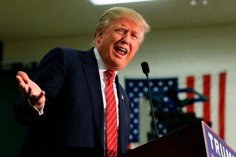 Donald Trump holds a rally in New Hampshire, where the first primary contest will take place. (AP Photo/Nati Harnik)