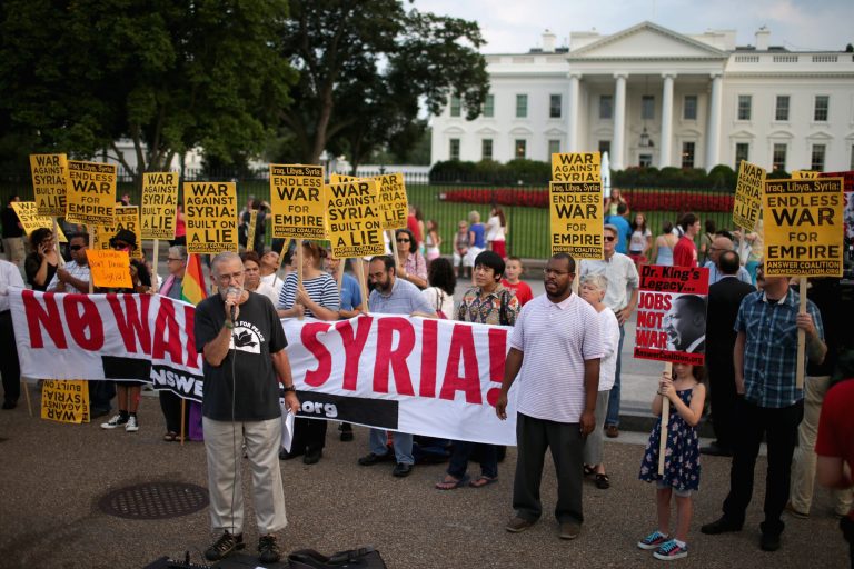  Former CIA intelligence officer Ray McGovern addresses a demonstration on the north side of the White House to protest any U.S. military action against Syria on Aug. 29. (Chip Somodevilla/Getty Images)