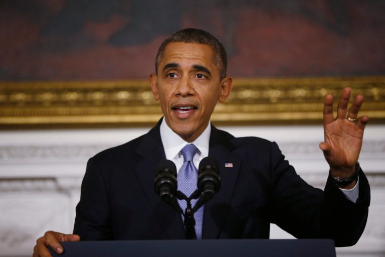 President Barack Obama speaks in the State Dining Room of the White House in Washington, Thursday, Oct. 17, 2013. Lawmakers Wednesday voted to avoid a financial default and reopen the government after a 16-day partial shutdown. (AP Photo/Charles Dharapak)