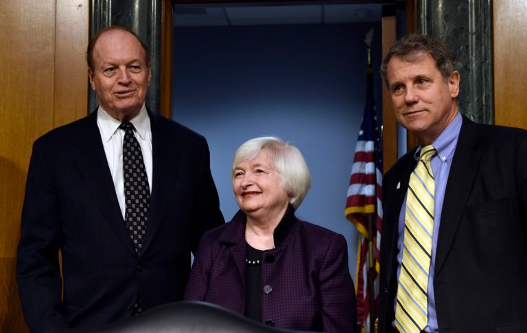 Senate Banking Committee Chairman Sen. Richard Shelby, R-Ala., left, and the committee's ranking member Sen. Sherrod Brown, D-Ohio, right, walk into the hearing room on Capitol Hill in Washington, Tuesday, Feb. 24, 2015, with Federal Reserve Board Chair Janet Yellen where she was to testify. (AP Photo/Susan Walsh)