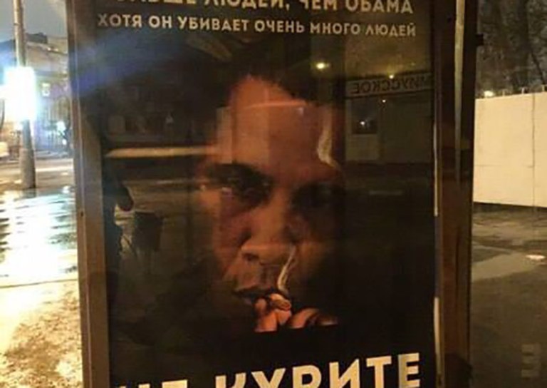 The ad, seen in Moscow's Red Square, claims Obama has killed anywhere up to 6 million people annually.