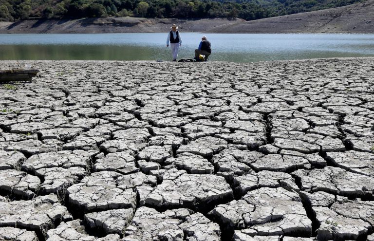 Cracks in the dry bed of the Stevens Creek Reservoir in Cupertino, Calif. (AP Photo/Marcio Jose Sanchez, File)