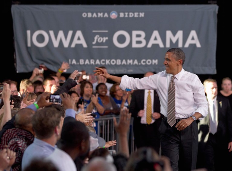 Obama strikes at Romney in Iowa, seeks 2008 energy