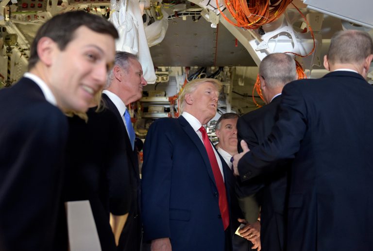 President Donald Trump tours the Boeing South Carolina facility in North Charleston, S.C., Friday, Feb. 17, 2017, to see the Boeing 787 Dreamliner. Trump is visiting Boeing before heading to his Mar-a-Lago estate in Palm Beach, Fla. for the weekend. Adviser Jared Kushner is at left. (AP Photo/Susan Walsh)