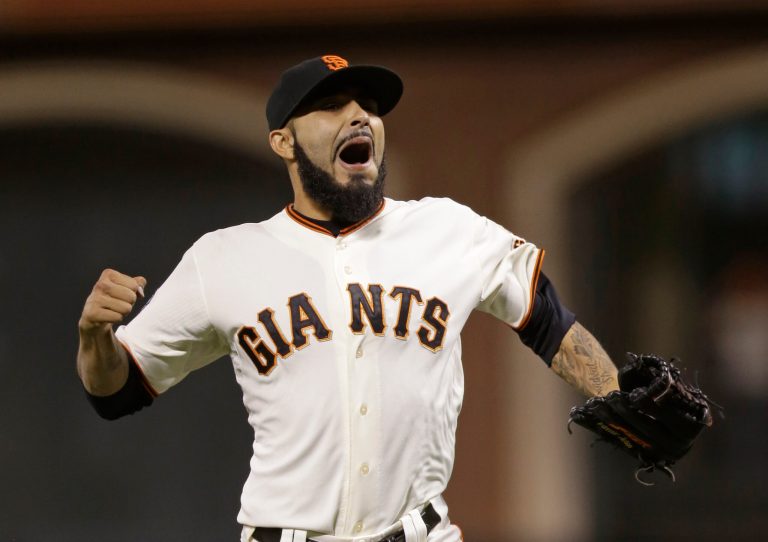 Marcio Jose Sanchez/AP
San Francisco Giants closer Sergio Romo reacts after the Giants defeated the Detroit Tigers 2-0 in Game 2 in the World Series on Thursday. 