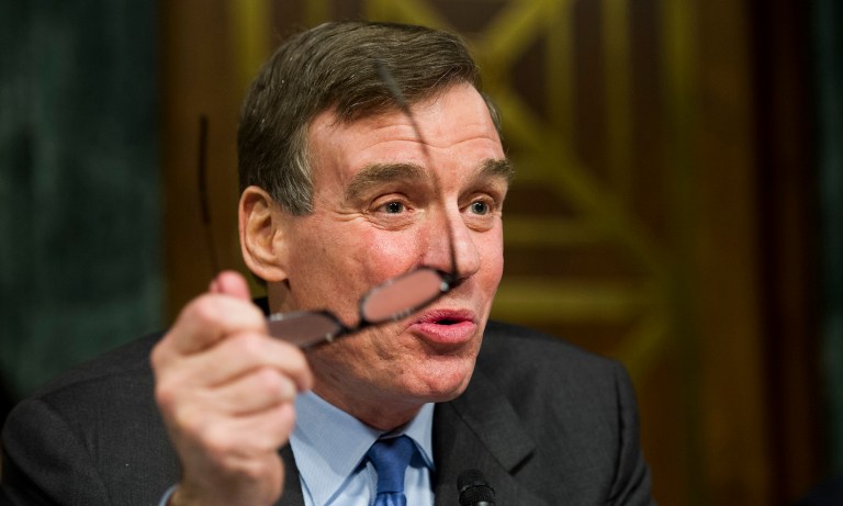 Sen. Mark Warner called for a completely independent investigation into Russian connections with President Trump and his associates after a report showed the White House had called members of Congress to help shoot down stories. (AP Photo/Cliff Owen)