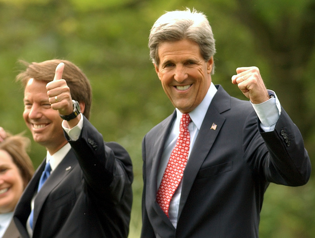 John Edwards and John Kerry arrive for a photo opportunity at Kerry's Pittsburgh residence, Wednesday, July 7, 2004.