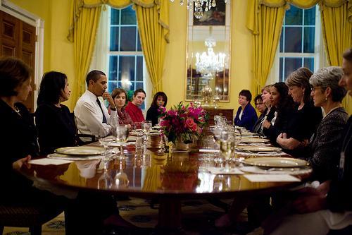 After complaints, Obama tried to include women