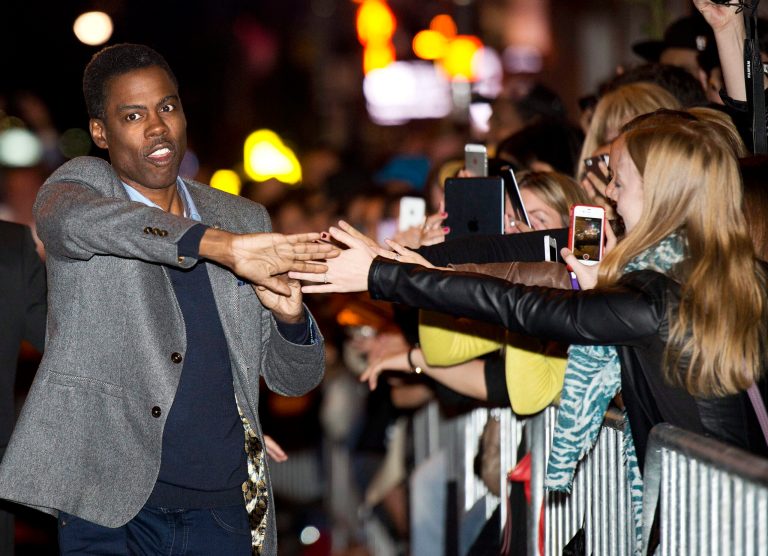 Director and actor Chris Rock greets fans for his new movie 