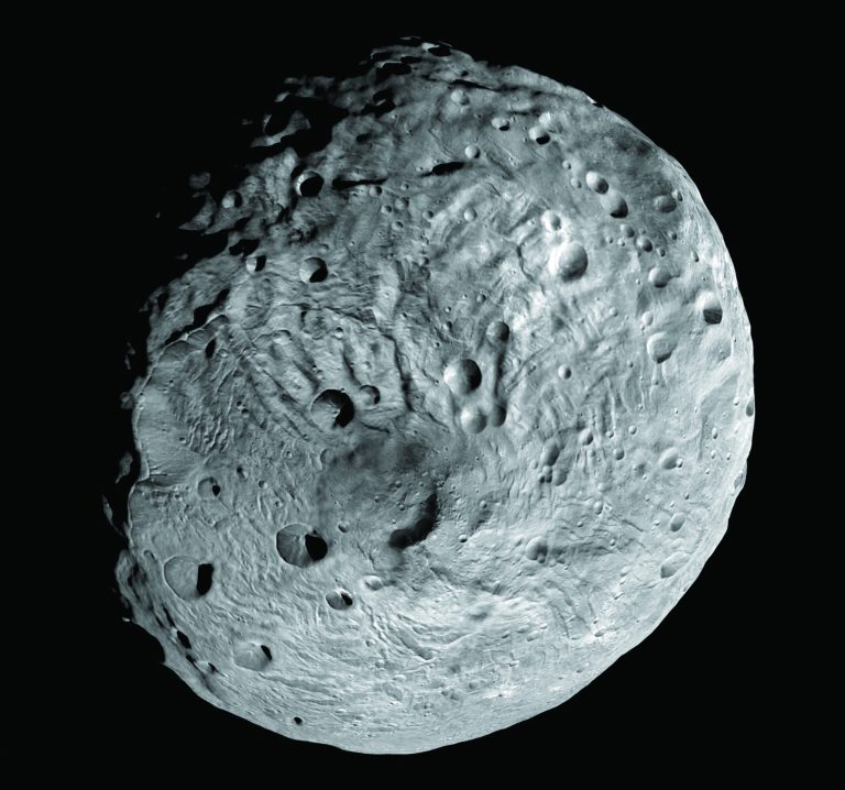 This undated image released by NASA and taken by the NASA Dawn spacecraft shows the south pole of the giant asteroid Vesta. After spending a year examining Vesta, Dawn was poised to depart and head to another asteroid Ceres, where it will arrive in 2015. (AP Photo/NASA)