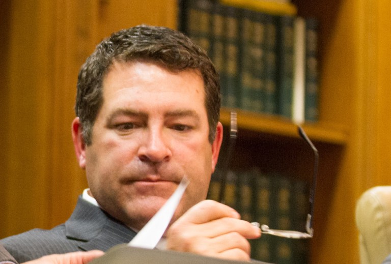 Green, who said his father was a Baptist preacher, raised concerns about a textbook that taught 