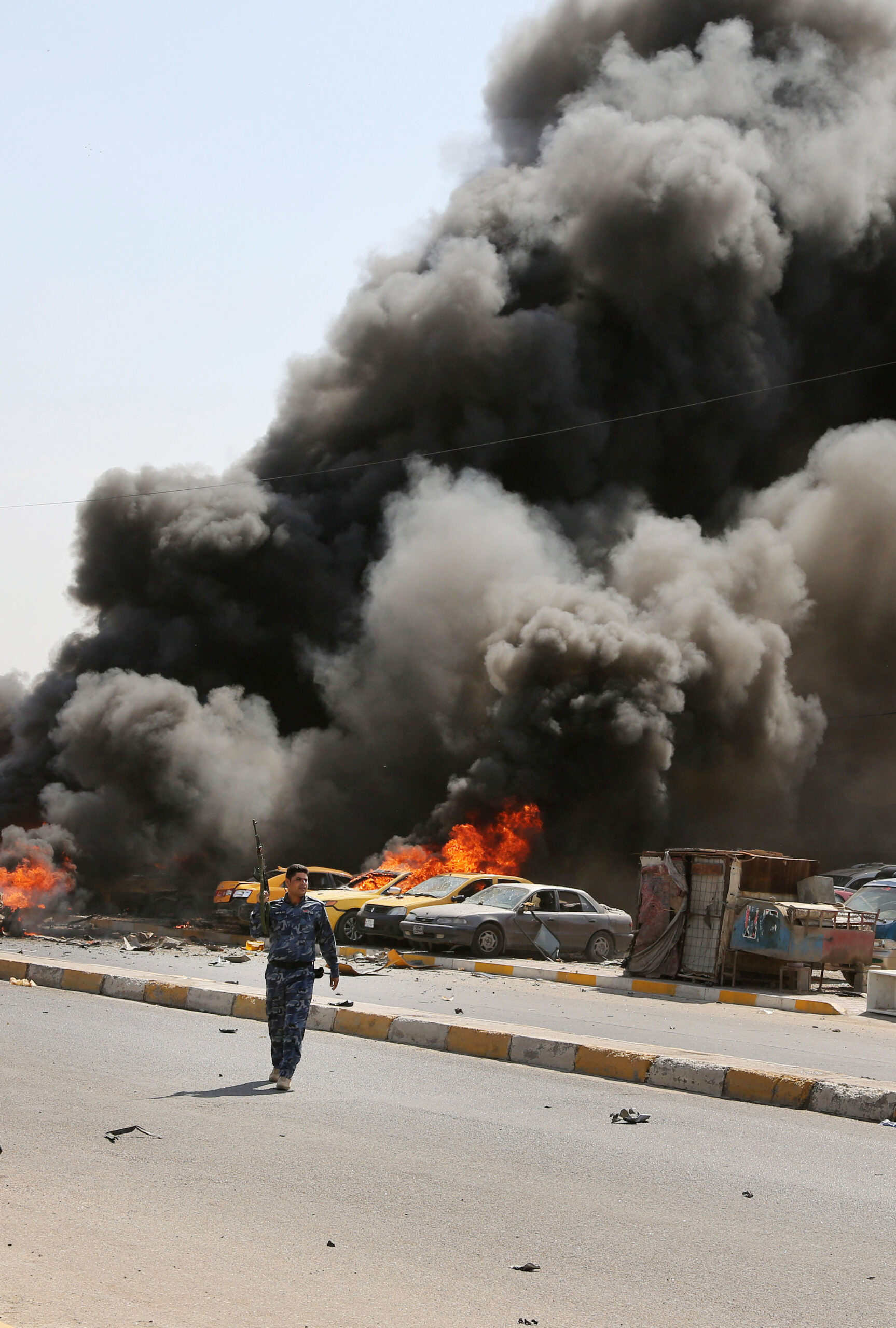 Car bomb blasts kill 34 as Iraqis await vote count