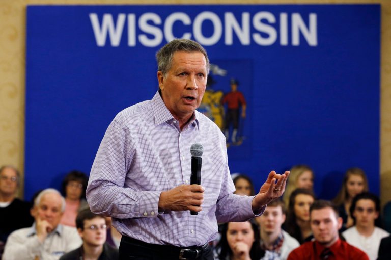 Republican presidential candidate Ohio Gov. John Kasich's presidential campaign has chosen to spar with Texas Sen. Ted Cruz's team rather than challenge Donald Trump. (AP Photo/Morry Gash)
