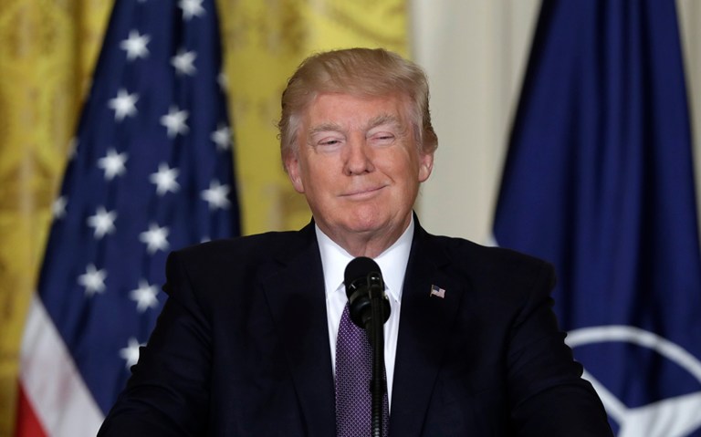 President Trump on Monday praised a book titled Reasons to vote for Democrats that is filled with blank pages following a Fox News segment on the book. (AP Photo/Evan Vucci)