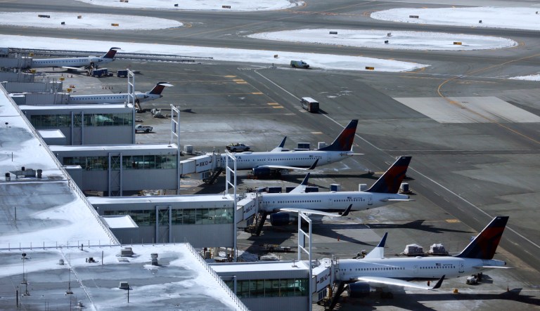 The U.S. passenger airline industry has a shortage of trained commercial pilots and too many effective monopolies controlling airline routes. (AP Photo/Seth Wenig)