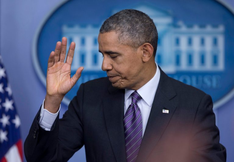 President Barack Obama waves as he concludes speaking in the briefing room of the White House in Washington, Thursday, April 17, 2014. The president spoke about health care overhaul and the situation in Ukraine. (AP Photo/Carolyn Kaster)