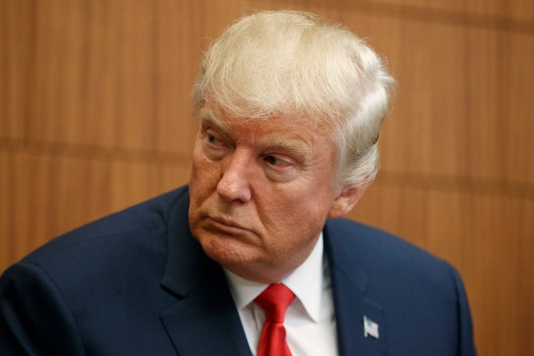 Two pending class-action lawsuits against Trump allege his so-called university was an elaborate scam. (AP Photo/ Evan Vucci)