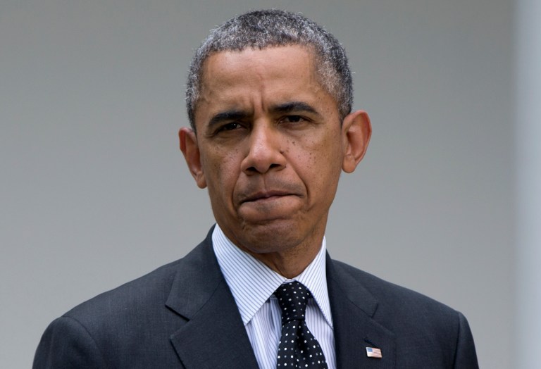 President Obama pauses as he speaks about the future of US troops in Afghanistan in the Rose Garden of the White House in Washington. (AP/Carolyn Kaster)