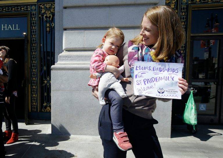 City is the first place in the country to require businesses to provide fully paid leave for new parents. (AP Photo/Jeff Chiu)