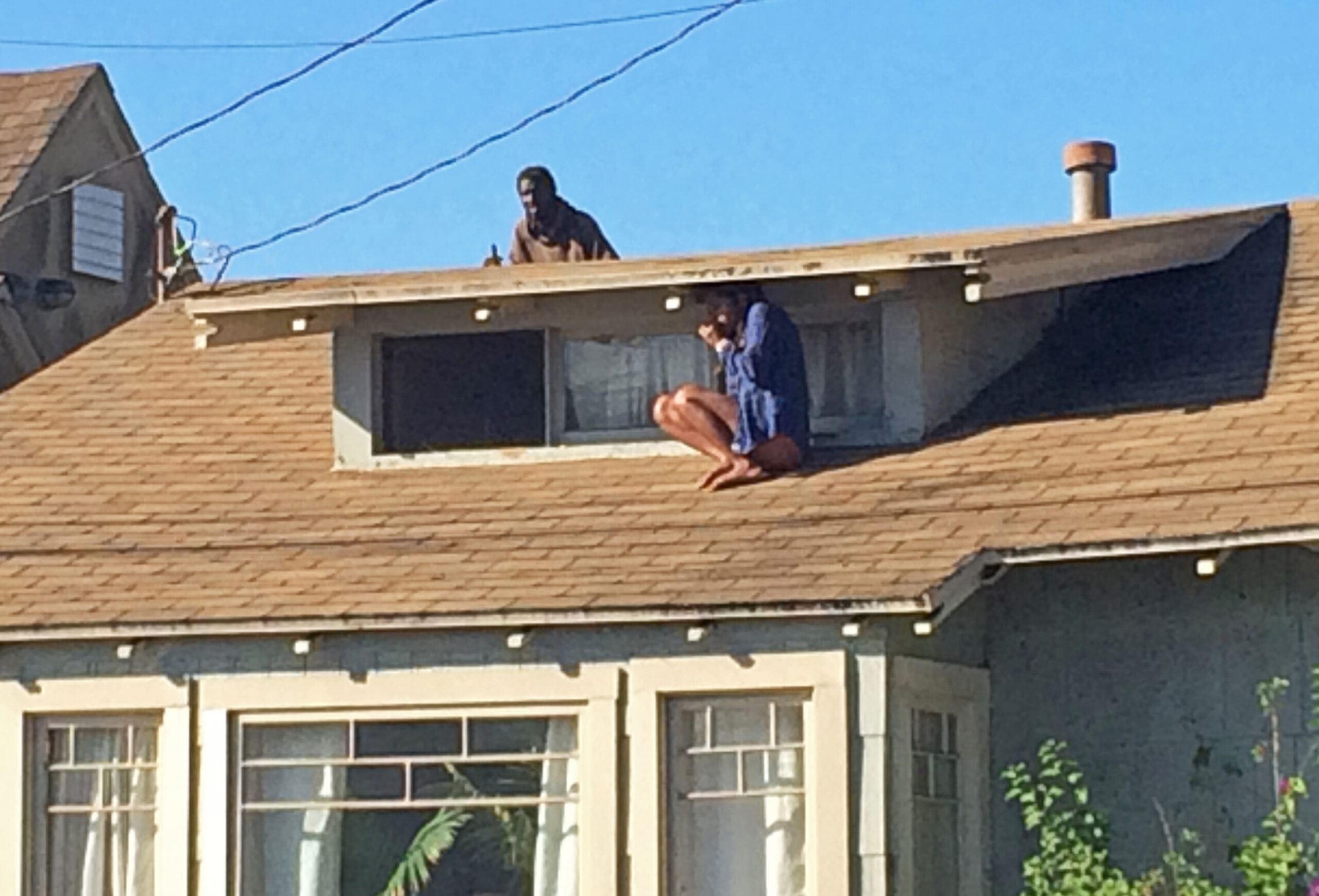 Intruder who followed woman onto roof is charged