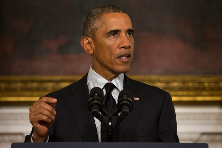 President Barack Obama gestures during a statement in the State Dining Room of the White House, on Thursday, Sept. 18, 2014, in Washington. Obama spoke after Congress voted to arm and train moderate Syrian rebels in the fight against the Islamic State group. (AP Photo/Evan Vucci)
