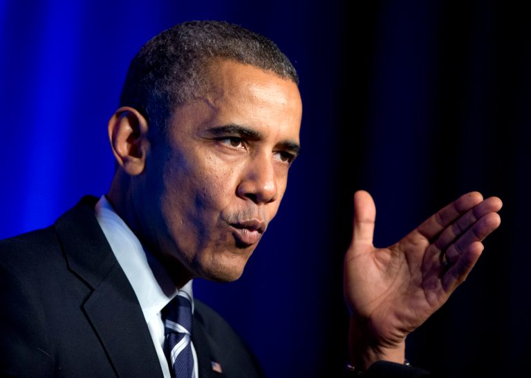 Organizing for Action, the advocacy group supporting President Barack Obama's agenda, is scaling back its fundraising efforts and cutting its paid staff in half as focus shifts to the approaching midterm elections, three Democratic officials said. (AP)