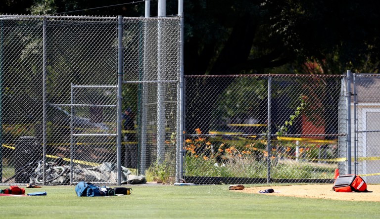 The footage ends with several people hovered over the man lying on the field. (AP Photo/Alex Brandon)