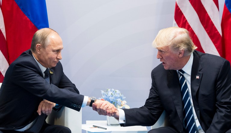 President Trump, right, shakes hands with Russian President Vladimir Putin during the G-20 summit in Hamburg Germany. (AP Photo/Marcellus Stein)