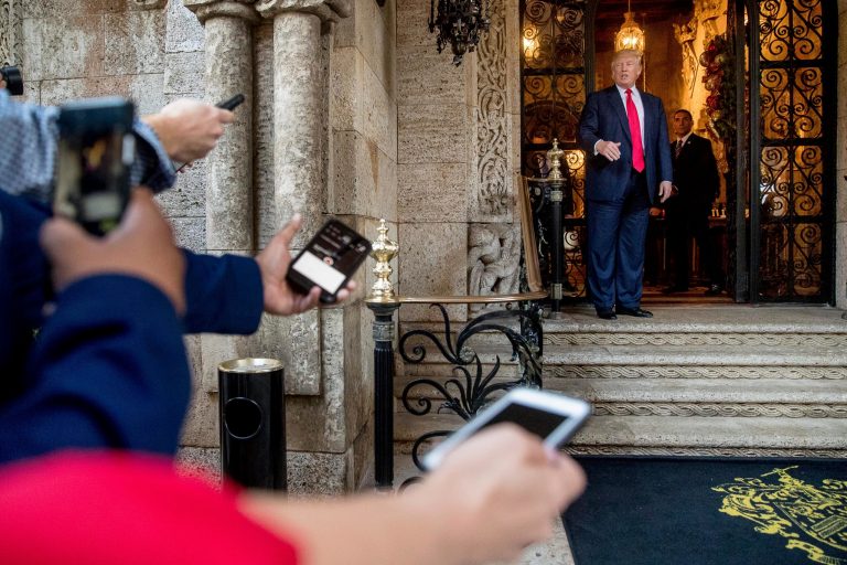 President-elect Donald Trump, right, speaks to members of the media after a meeting with admirals and generals from the Pentagon at Mar-a-Lago, in Palm Beach, Fla., Wednesday, Dec. 21, 2016. (AP Photo/Andrew Harnik)
