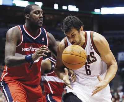 Morry Gash/AP
Captain Andray Blatche and the Wizards have yet to win a game this season.