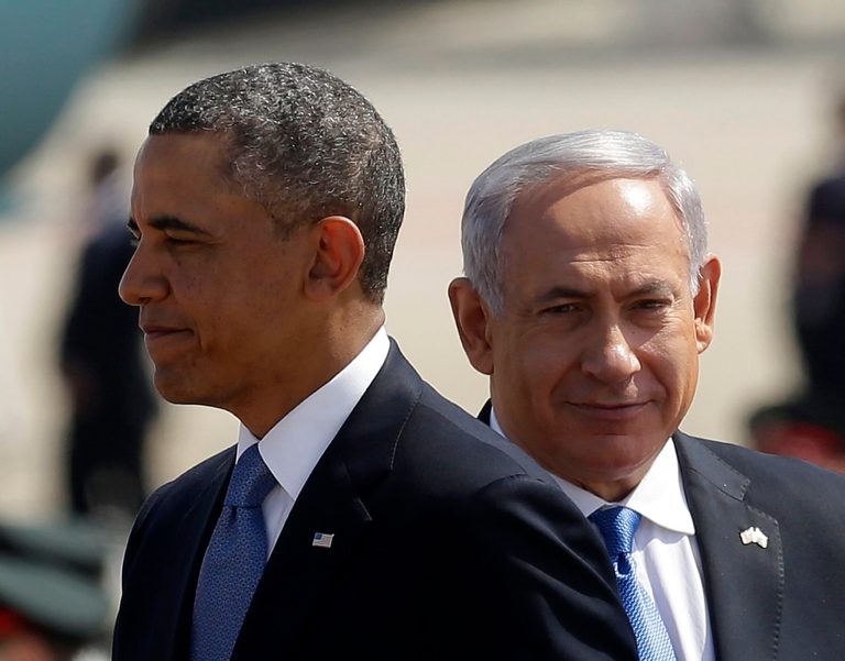 President Barack Obama, left, with Israeli Prime Minister Benjamin Netanyahu, right, during his arrival ceremony at Ben Gurion International Airport in Tel Aviv, Israel, Wednesday, March 20, 2013. (AP Photo/Pablo Martinez Monsivais)
