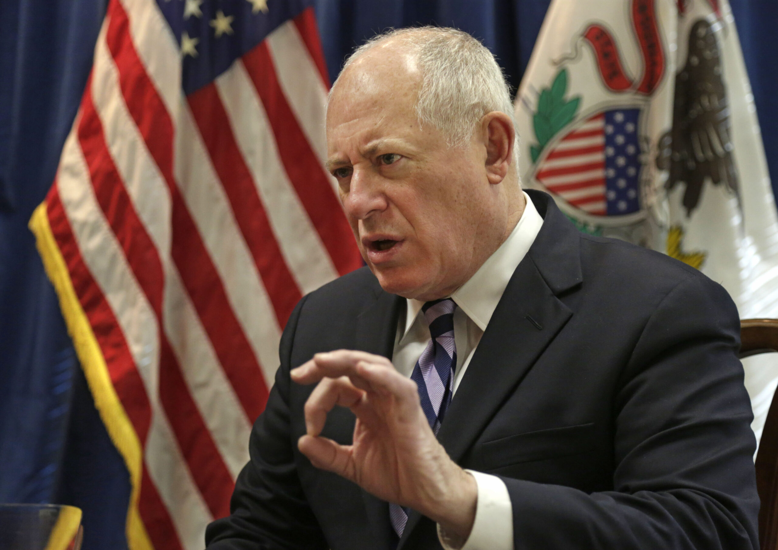 Illinois governor presses bid to raise minimum wage