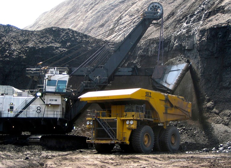 In this April, 2007 file photo, a shovel prepares to dump a load of coal into a 320-ton truck at the Black Thunder Mine in Wright, Wyo. (AP Photo/Matthew Brown, File)