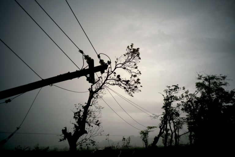 Though power is still out for many of Puerto Rico's residents, 90 percent of industries and 75 percent of businesses have electricity. (AP Photo/Ramon Espinosa)