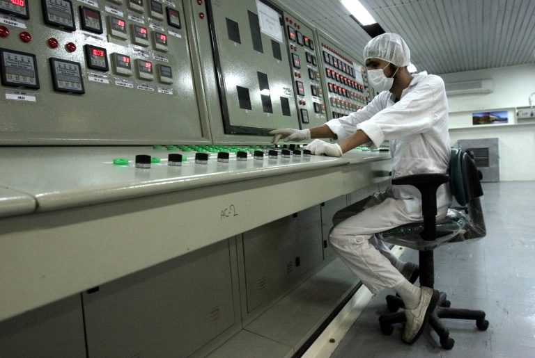 An Iranian technician works at the Uranium Conversion Facility just outside the city of Isfahan, Iran. (AP File Photo)