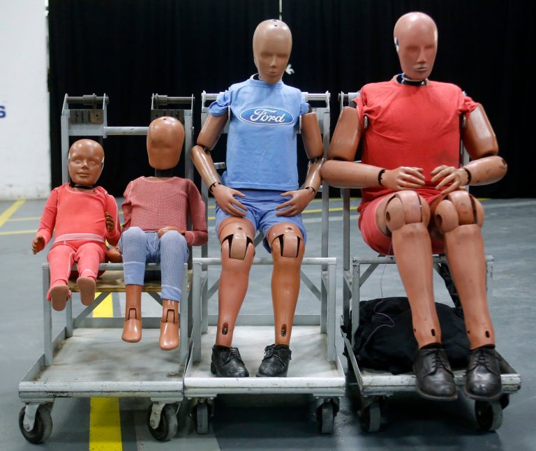 Commonly called a crash test dummies, full-scale anthropomorphic test devices that represent children to adults, are displayed at Ford Motor Co.'s Dearborn Development Center in Michigan last month. (AP Photo/Duane Burleson)