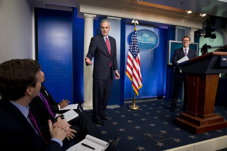 White House Chief of Staff Denis McDonough, center, gestures toward incoming White House press secretary Josh Earnest, left, while appearing at a press briefing at the White House last year. (AP Photo/Jacquelyn Martin)