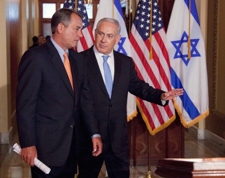 In this May 24, 2011 file photo, Israeli Prime Minister Benjamin Netanyahu walks with House Speaker John Boehner of Ohio to make a statement on Capitol Hill in Washington. Boehner has invited Netanyahu to address Congress about Iran. (AP Photo/Evan Vucci, File)
