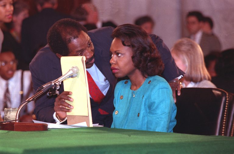 University of Oklahoma law professor Anita Hill receives councel from Charles Ogeltree while testifying before the Senate Judiciary Committee on Capitol Hill in Washington, D.C., Friday, Oct. 11, 1991. 