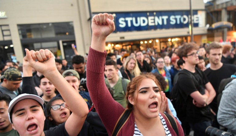 Several areas around the University of California, Berkeley, were closed off on Sept. 14 ahead of an evening appearance by a conservative commentator, as protestors flooded the streets. That event, among others, has sparked a conversation about free speech on campus. (AP Photo/Josh Edelson)