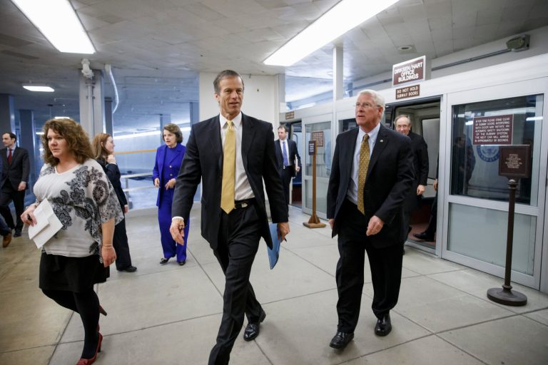 Sen. John Thune, R-S.D., center, and Sen. Roger Wicker, R-Miss., second from right, walk to the Senate floor in the U.S. Capitol complex last month. (AP Photo/J. Scott Applewhite)