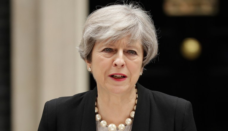 British Prime Minister Theresa May on Tuesday praised first responders in Manchester, the day after an apparent suicide bomber attacked an Ariana Grande concert as it ended Monday night, killing over a dozen of people among a panicked crowd of young concertgoers. (AP Photo/Matt Dunham)