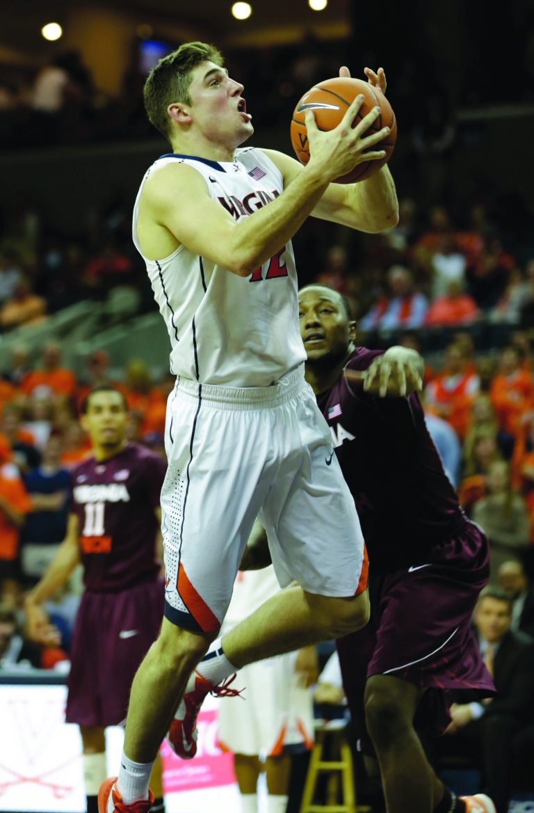 Steve Helber/AP
Virginia guard Joe Harris scored a career-high 26 points to lead the Cavaliers over Virginia Tech 73-55 on Tuesday.