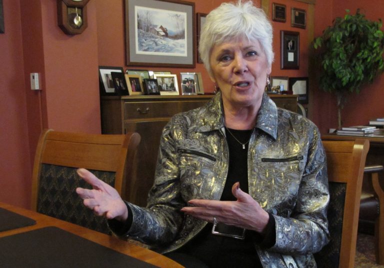 In this photo from Thursday, Dec. 19, 2013, Kansas Insurance Commissioner Sandy Praeger discusses issues related to the federal overhaul of health care during an interview in her office in Topeka, Kan. Praeger is a Republican but supports expanding Medicaid under the federal health care law. (AP Photo/John Hanna)