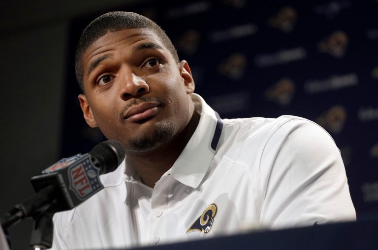 St. Louis Rams seventh-round draft pick Michael Sam listens to a question during a news conference at the NFL football team's practice facility Tuesday, May 13, 2014, in St. Louis. (AP Photo/Jeff Roberson)