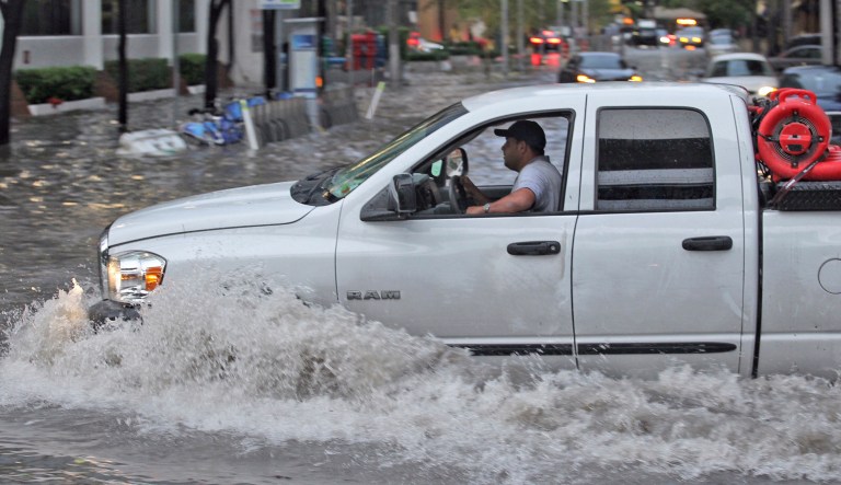 The federal flood protection standards would have steered federal infrastructure investments toward higher ground. (Carl Juste/Miami Herald via AP)