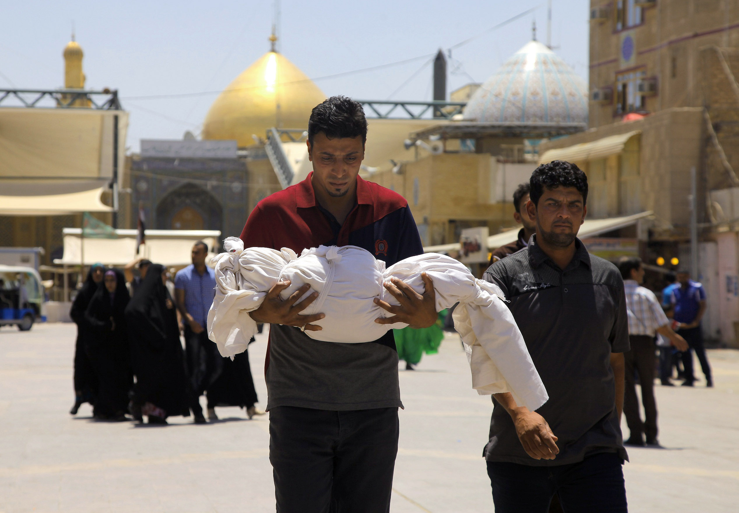 Officials say attacks kill 13 people in Iraq